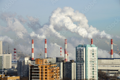 Smoking chimneys of the combined heat and power plant 20. Akademichesky district, Moscow, Russia photo