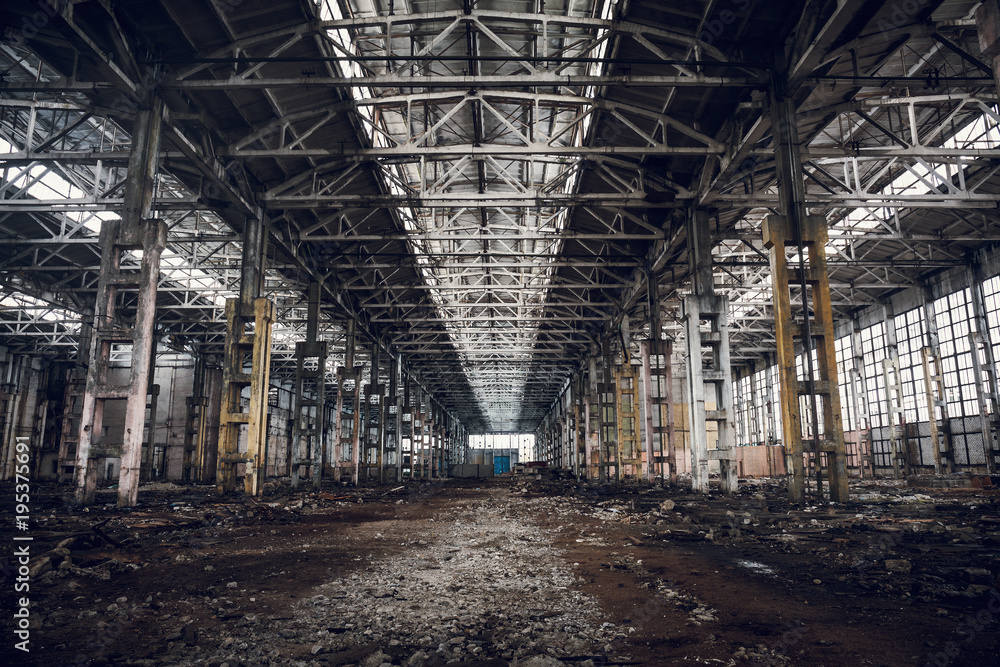 Abandoned ruined industrial factory building, ruins and demolition