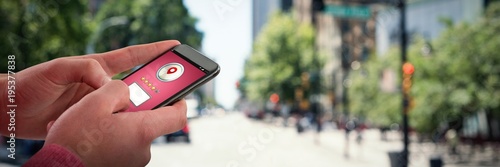 Composite image of close-up of man using mobile phone