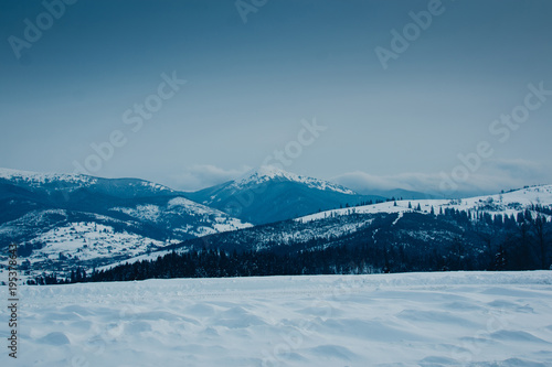 Beautiful winter view in Carpathian mountains, Ukraine, mountain panoramic landscape