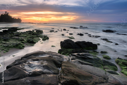 Seascape at the beach with natural coasltal rocks.