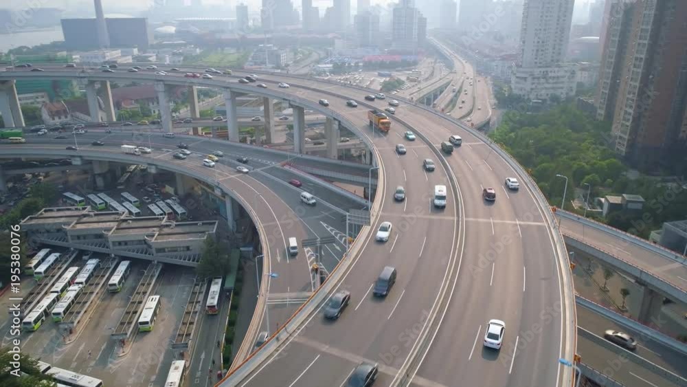 SHANGHAI, CHINA - MAY 5, 2017: Aerial view of Nanpu bridge highway junction, modern architecture SHANGHAI, CHINA - MAY 5, 2017: Aerial view of Nanpu bridge highway junction, modern architecture