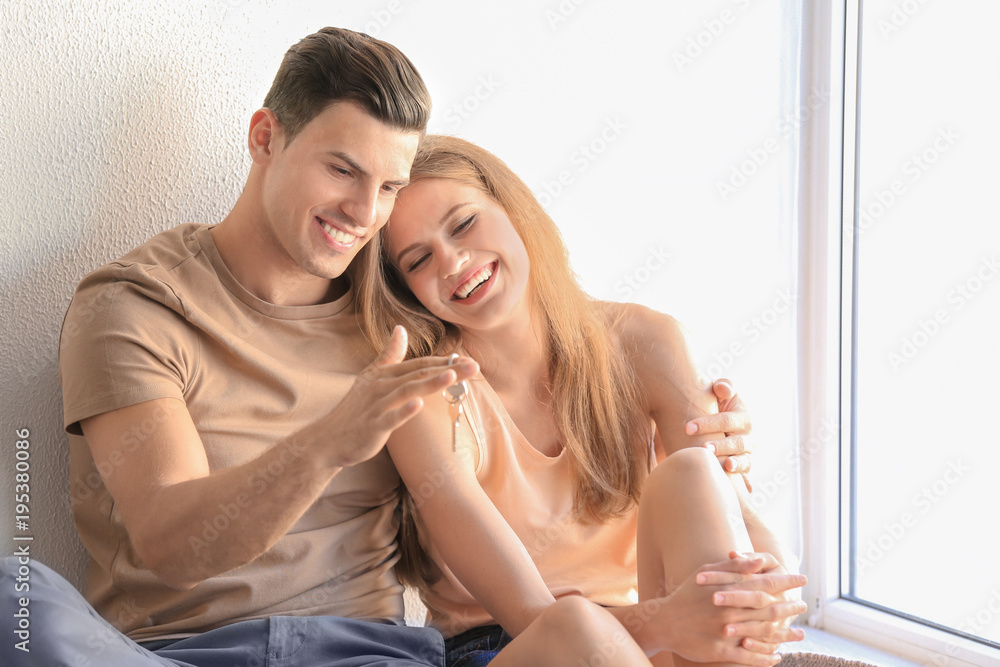 Young couple in their new house Young couple in their new house