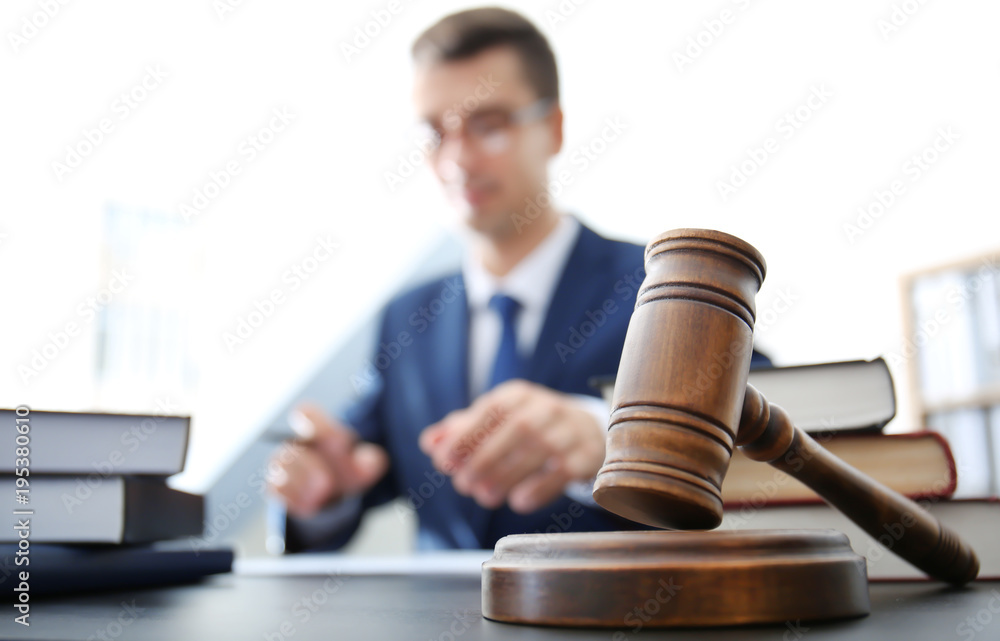 Gavel on table in lawyer's office Gavel on table in lawyer's office