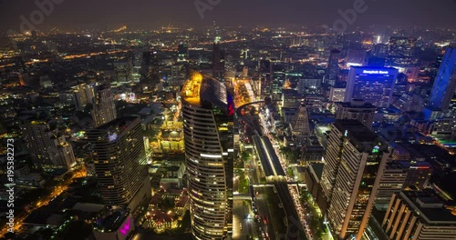 Aerial Time lapse of Bangkok urban cityscape at night.