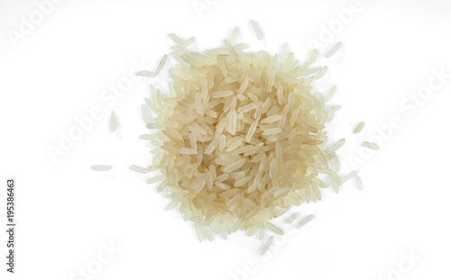 Handful of jasmine rice on white background. One of the varieties of rice.
