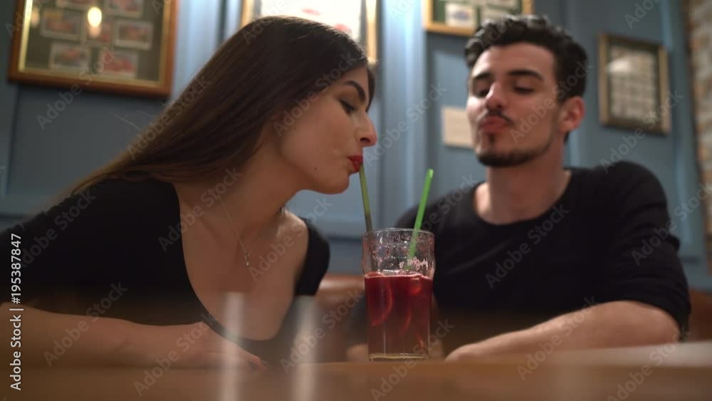 Couple drinking juice Couple drinking juice