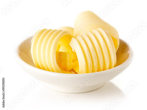 Butter curls isolated on white background photo