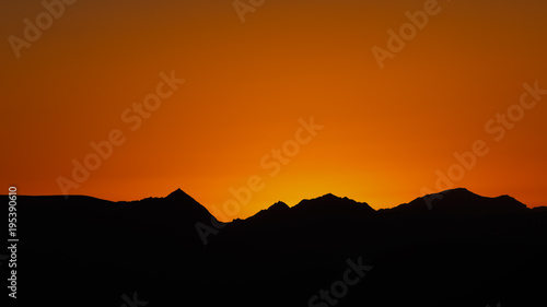 mountain silhouette in the Negev desert in Israel at sunset sunrise