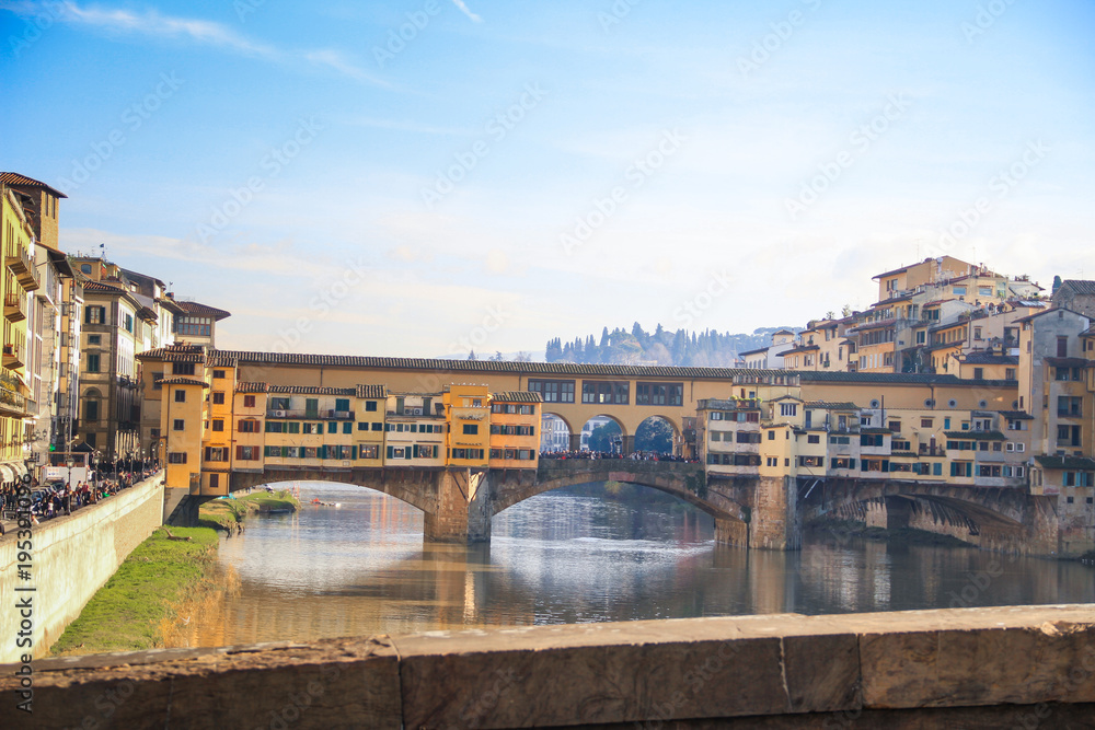 Cityscape with the Ponte Vecchio bridge over the Arno river in Florence, Tuscany, Italy