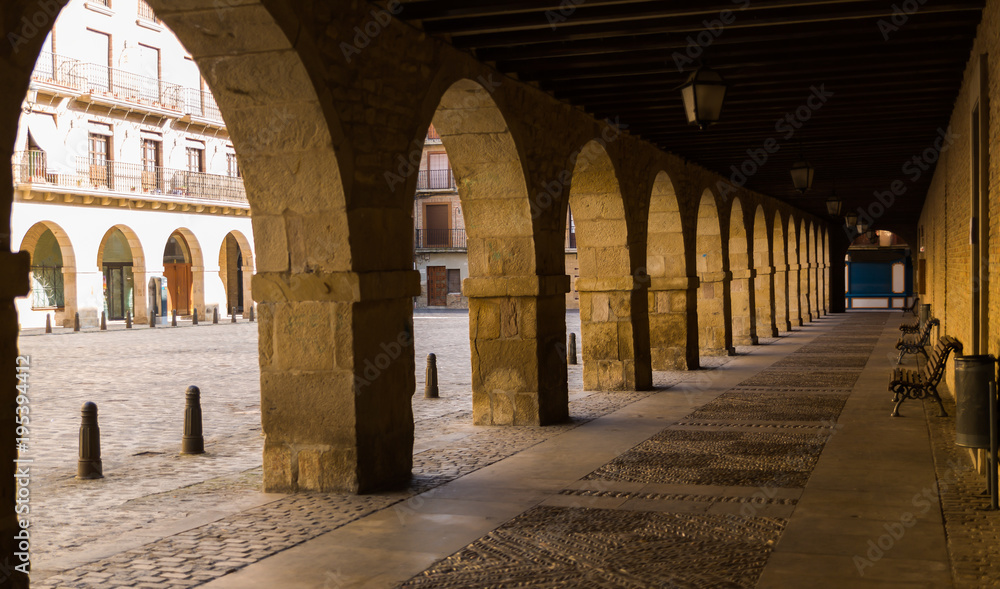 The porticos of a plaza in Puente la Reina, Spain