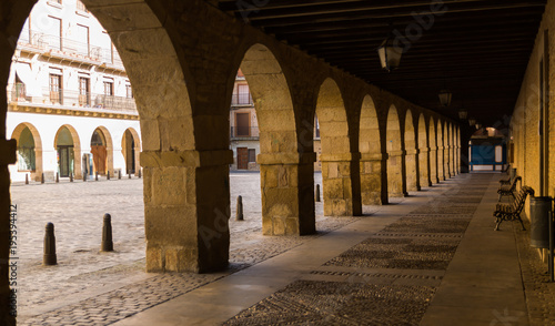 The porticos of a plaza in Puente la Reina, Spain