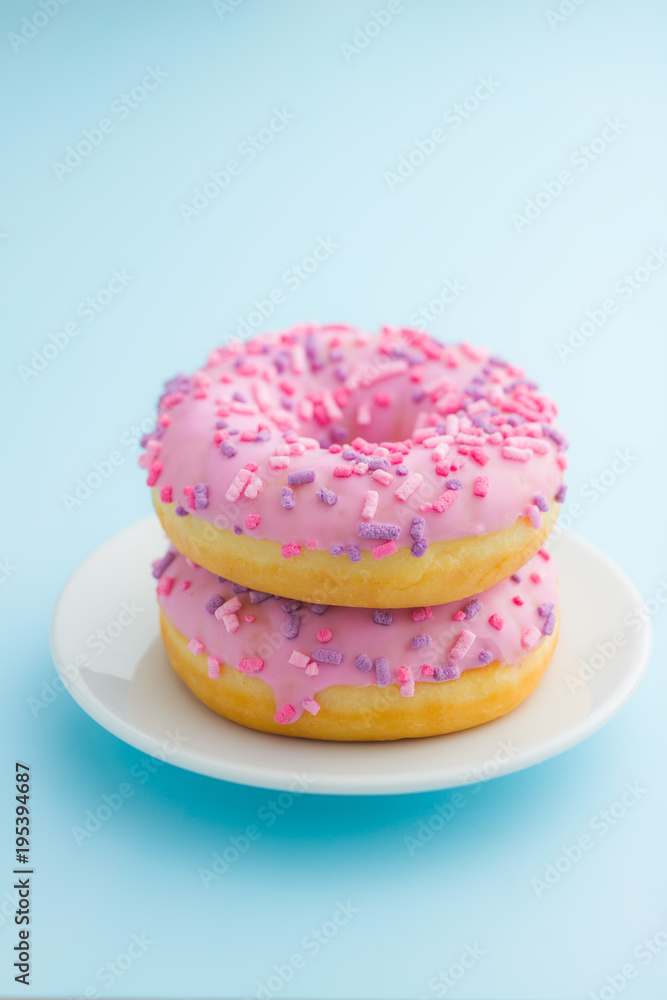 Two pink donuts.