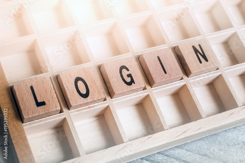 Closeup Of The Word Login Formed By Wooden Blocks In A Typecase photo