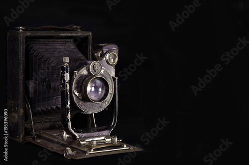 old camera on a black background