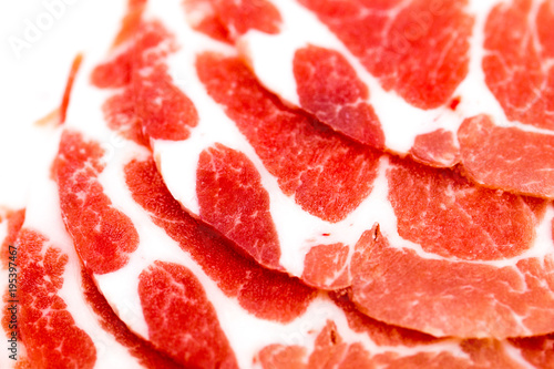 Close-up sliced raw pork isolated on white background. It copy space and selection focus.