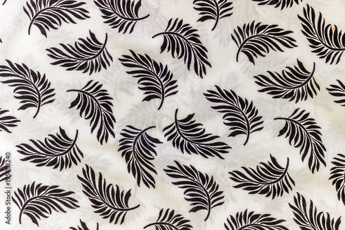 Seamless pattern with black leaves on white background