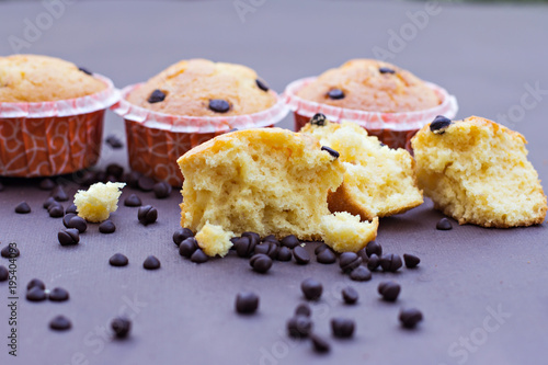 Homemade vanilla cupcakes with chocolate drops.