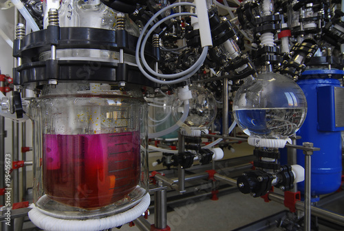 manufacture of medicines at a drug factory. crimson liquid in a flask