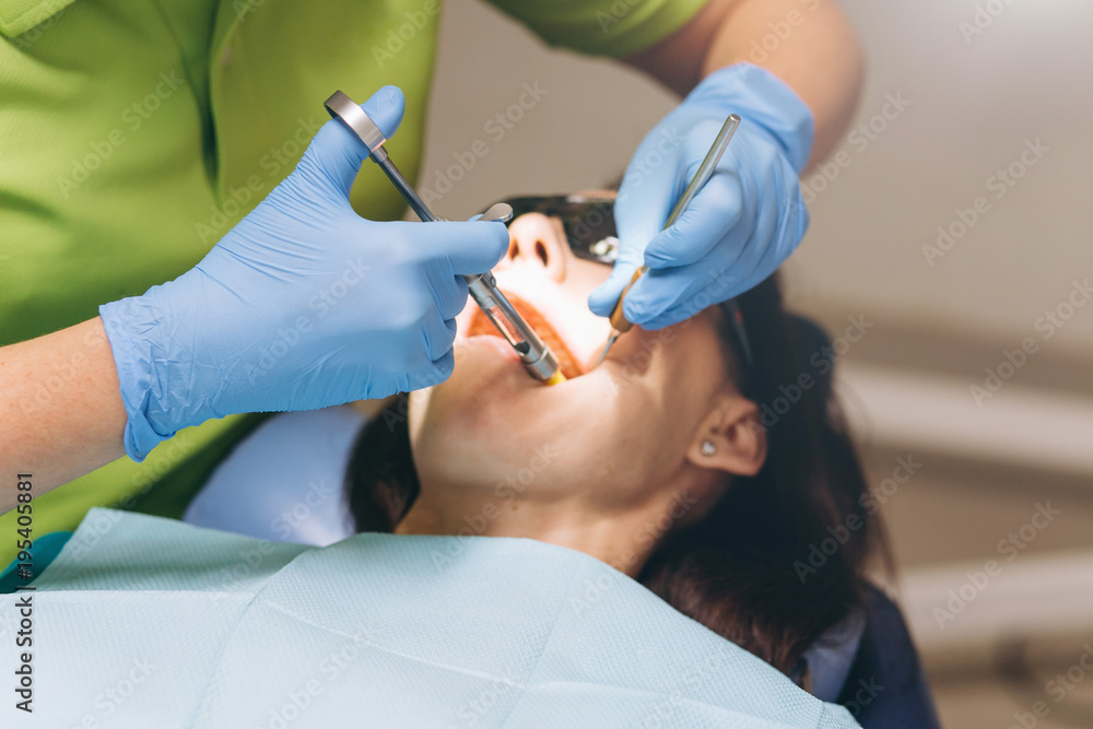 The dentist does anesthetic injection. Local anesthesia. Stock Photo