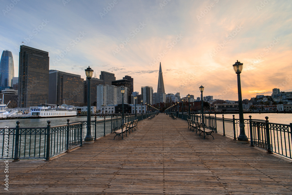 San Francisco Skyline and Boardwalk Sunset. Pier 7, San Francisco, California, USA.