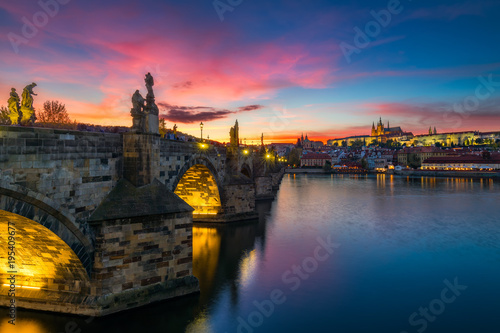 Famous iconic image of Charles bridge at sunset in spring  Prague  Czech Republic. Concept of world travel  sightseeing and tourism.