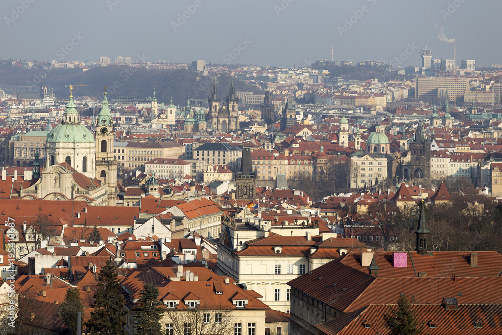 Sunny frosty winter Prague City with its Cathedrals, historical Buildings and Towers, Czech Republic