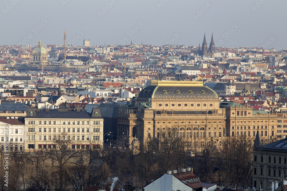 Sunny frosty winter Prague City with its Cathedrals, historical Buildings and Towers, Czech Republic