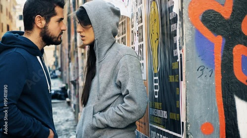 meeting between pusher and customer in the street,close up