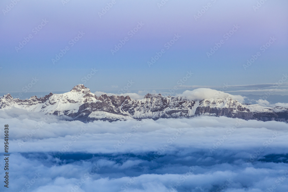 High mountain range during sunrise in the French Alps