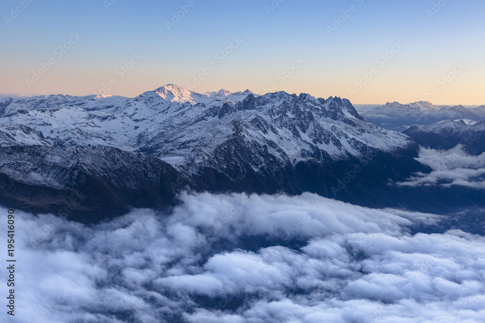 Cloudy mountains scenery in the French Alps during sunrise