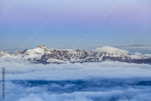 High mountain range during sunrise in the French Alps