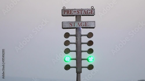 Drag racing street tree light. Stage lamp signal at quarter mile circuit.