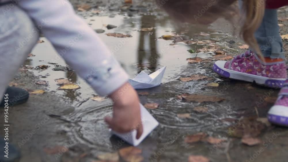 Playing with paper boats