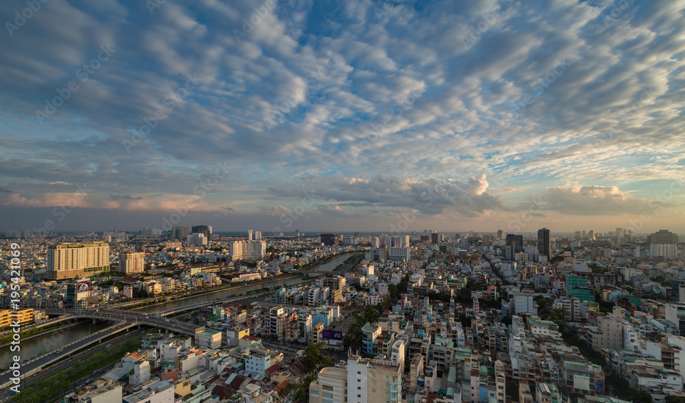HO CHI MINH, VIETNAM - NOV 20, 2017: Royalty high quality stock image aerial view of Ho Chi Minh city, Vietnam. Beauty skyscrapers along river light smooth down urban development in Ho Chi Minh City