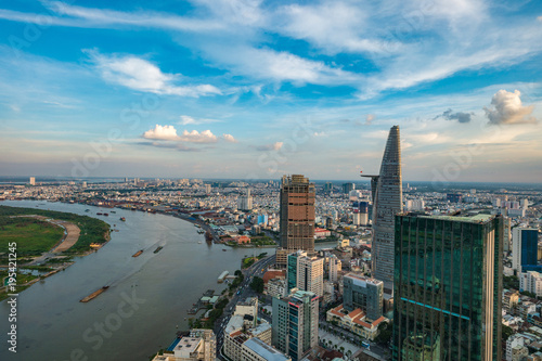 HO CHI MINH, VIETNAM - NOV 20, 2017: Royalty high quality stock image aerial view of Ho Chi Minh city, Vietnam. Beauty skyscrapers along river light smooth down urban development in Ho Chi Minh City