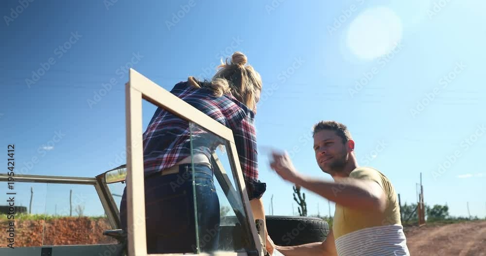 Couple looking at map on a sunny day Couple looking at map on a sunny day