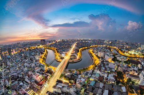 HO CHI MINH, VIETNAM - NOV 20, 2017: Royalty high quality stock image aerial view of Ho Chi Minh city, Vietnam. Beauty skyscrapers along river light smooth down urban development in Ho Chi Minh City