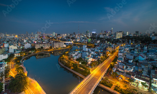 HO CHI MINH  VIETNAM - NOV 20  2017  Royalty high quality stock image aerial view of Ho Chi Minh city  Vietnam. Beauty skyscrapers along river light smooth down urban development in Ho Chi Minh City