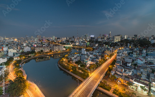 HO CHI MINH, VIETNAM - NOV 20, 2017: Royalty high quality stock image aerial view of Ho Chi Minh city, Vietnam. Beauty skyscrapers along river light smooth down urban development in Ho Chi Minh City
