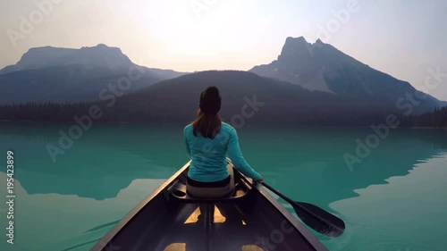 Man travelling on boat in lake photo