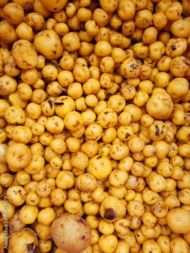 a unique kind of potato called papa criolla or creole in a local market in Bogota, Colombia