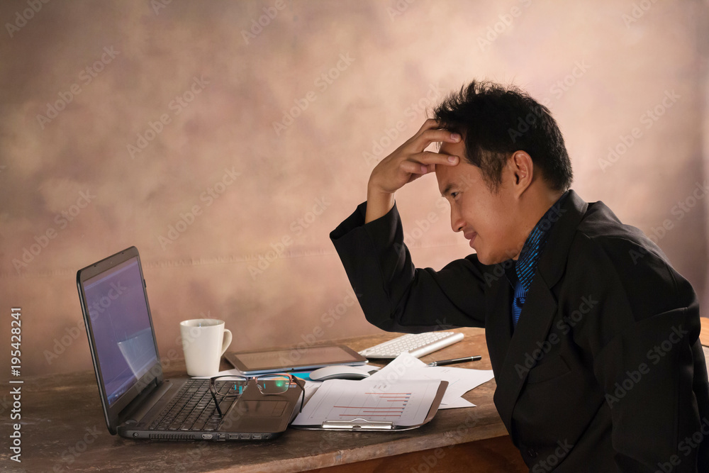 Office man is working and View stock chart
Office man is working and View stock chart
