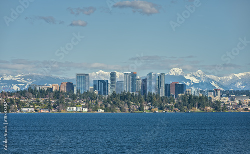 Bellevue, Washington and Cascade Mountains Shine on a Sunny Afternoon across from Lake Washington