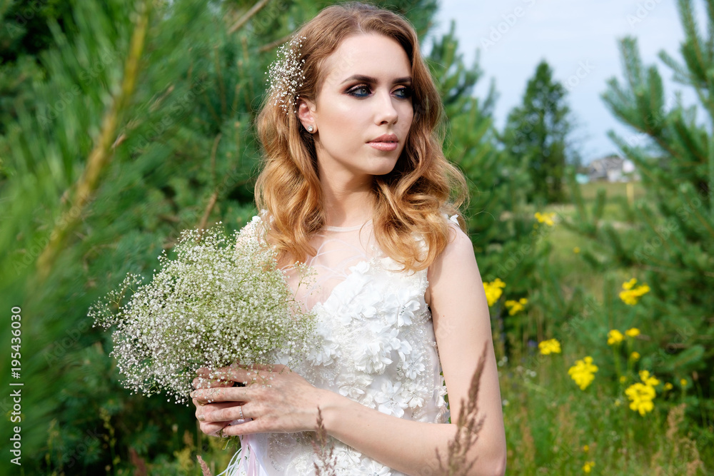 young pretty bride in white wedding dress outdoors, make up and hairstyle young pretty bride in white wedding dress outdoors, make up and hairstyle