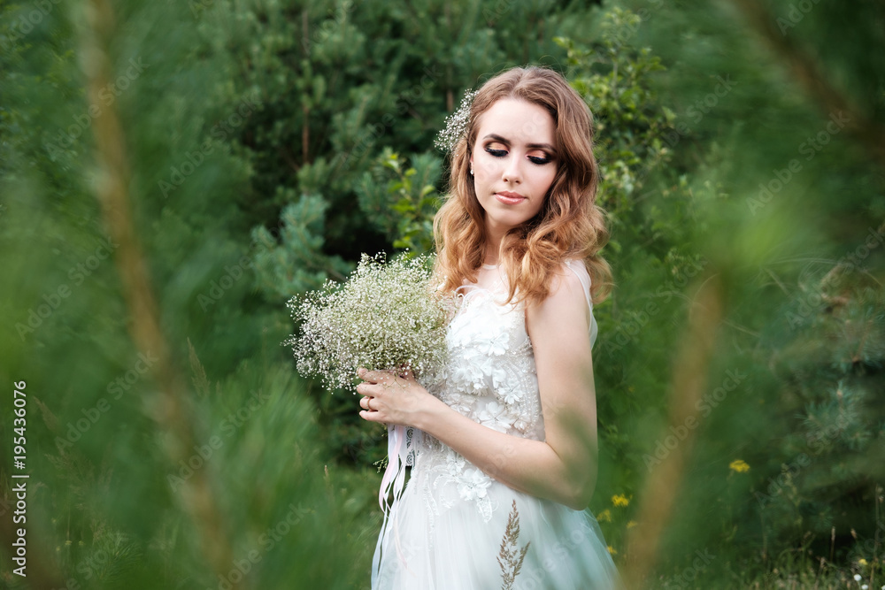 young pretty bride in white wedding dress outdoors, make up and hairstyle young pretty bride in white wedding dress outdoors, make up and hairstyle