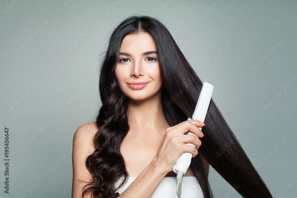 Attractive Woman with Curly Hair and Long Straight Hair Using Hair  Straightener. Hair Problem and Haircare Concept Photos | Adobe Stock