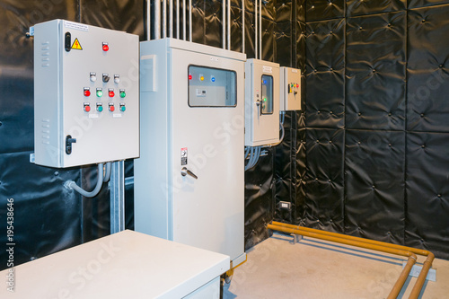 Electrical Room, medium and high voltage switcher, equipment, panel to control and protect the electrical equipment and system by fuse, circuit breaker, control panel at power plant and substation