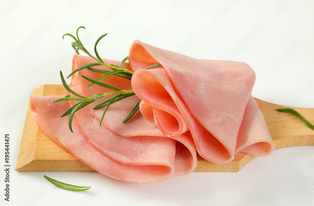 thin slices of ham and rosemary