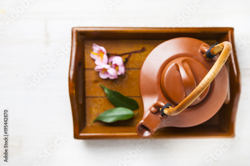 Wallpaper Mural Ceramic teapot, tea leaves and sakura Torontodigital.ca